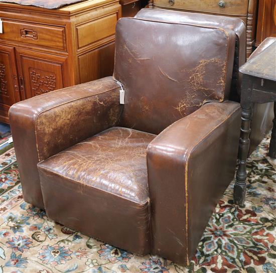 A pair of French leather club armchairs